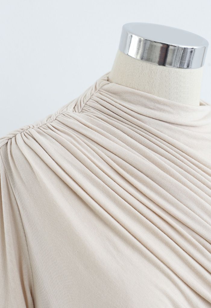 VOLANT CREME. Geplooide top